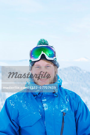 Man smiling in snow