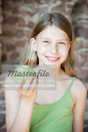 Young girl with apple