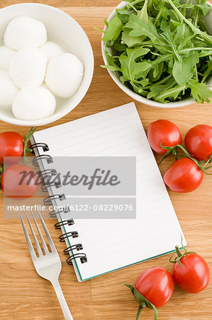 Food journal with bowls of food