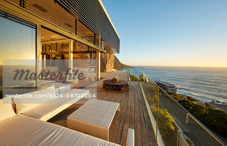 Modern luxury patio with sunset ocean view