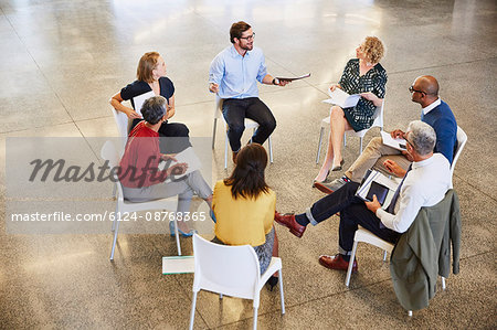 Business people talking in circle meeting Business people talking in circle meeting
