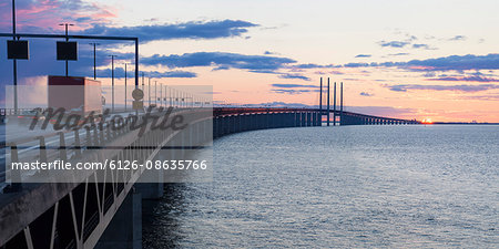 Sweden, Skane, Malmo, Oresund Bridge at  sunset