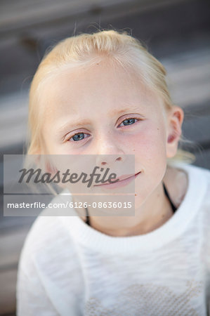 Sweden, Vastergotland, Lerum, Portrait of blonde girl (8-9)