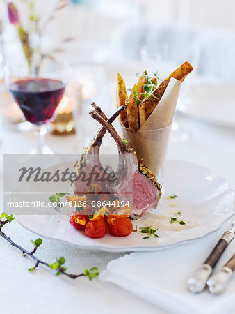 Sweden, Lamb chops and french fries on table