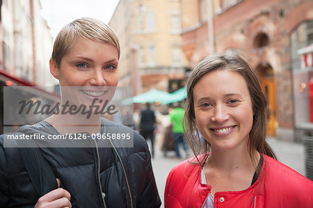 Sweden, Stockholm, Ostermalm, Portrait of two women in old town