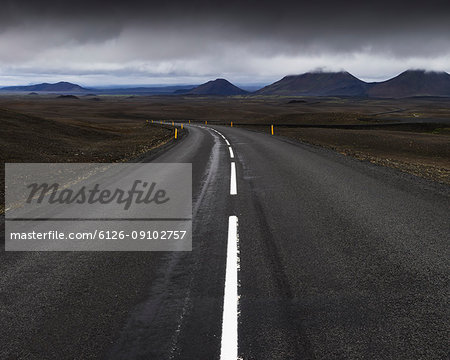 Road and mountain range on horizon