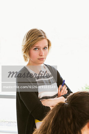 Young woman looking at camera with confidence