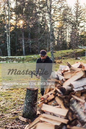 A man splitting fire wood