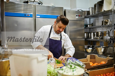 Chef cutting vegetables