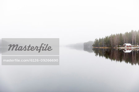 Fog over Ormlangen lake in Finspang, Sweden