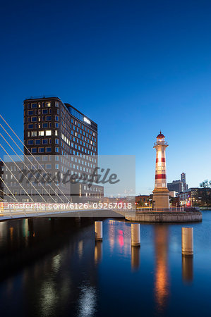Lighthouse by river at sunset in Malmo, Sweden