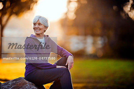 Elderly Woman Taking Picture of Rocks · Free Stock Photo