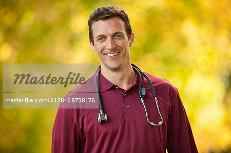 Portrait of a smiling male nurse.