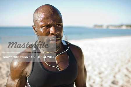 Muscular man on the beach.