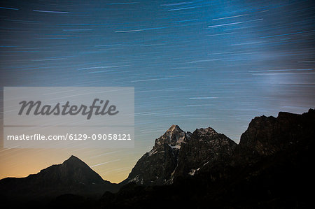 Startrail over the top of Monviso. Lake Superior, Cozian Alps, Piedmont, Italy Europe