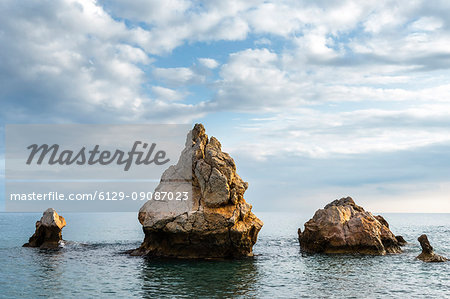 Rocks emerging from the Tyrrhenian Sea Europe, Italy, Sicily region, Palermo district, Sant'Elia municipality