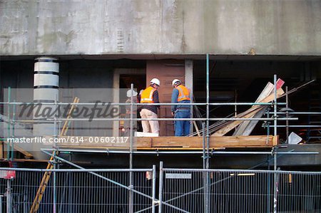 Men up on construction site