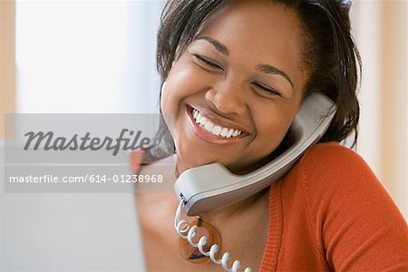 Happy woman on telephone