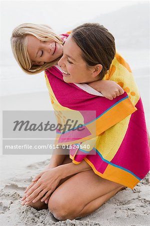 Mother and daughter in a towel