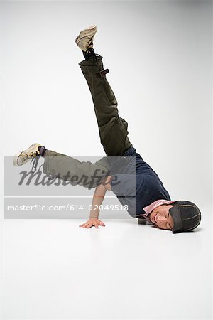Young man breakdancing
