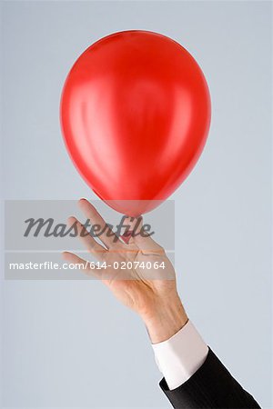 Person holding a balloon