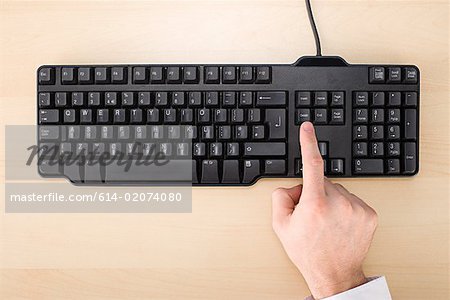 Person using computer keyboard
