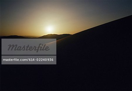 Sunset over dunes of the sahara