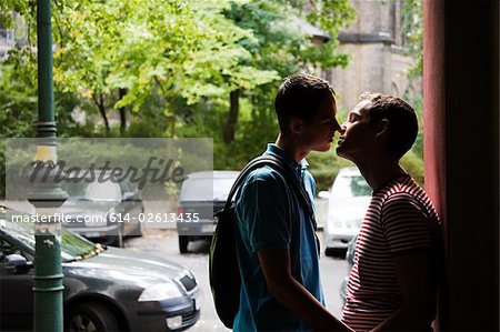A gay couple kissing