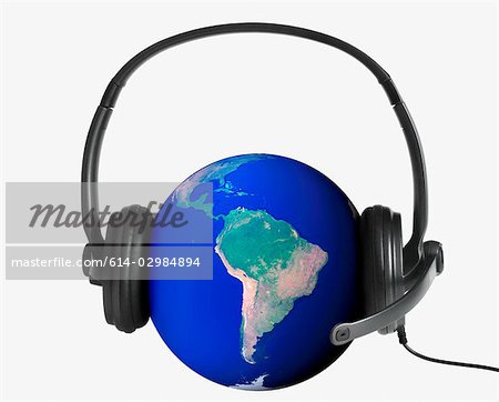 Planet earth wearing a telephone headset