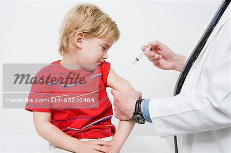 Boy getting immunization