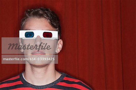 Young man wearing 3D glasses