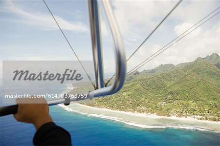 Man paragliding, aerial view