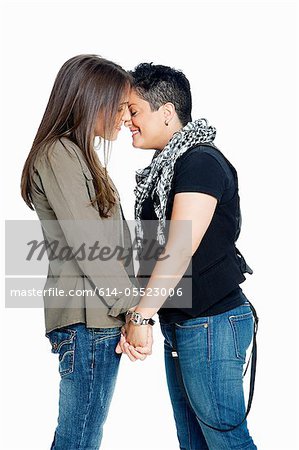 Lesbian couple against white background