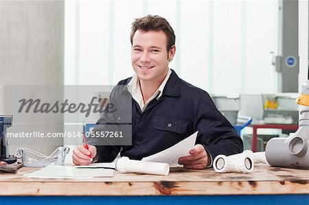 Apprentice plumber in class, portrait