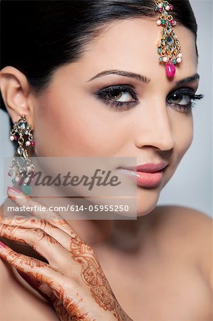 Portrait of a beautiful woman with mehndi