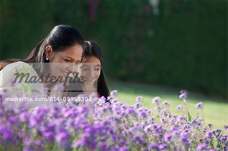 Girl and her grandmother in a garden Girl and her grandmother in a garden