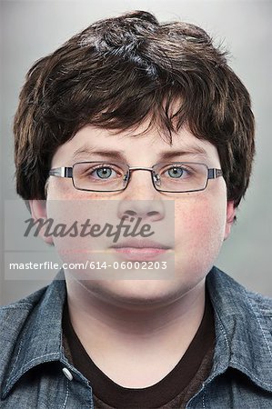 Portrait of young teenage boy wearing spectacles - Stock Photo - Masterfile  - Premium Royalty-Free, Code: 614-06002203