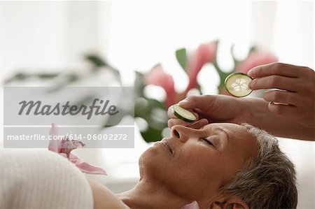 Senior woman relaxing on massage table