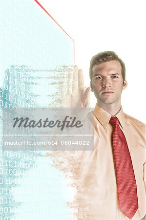 Businessman becoming pixelated