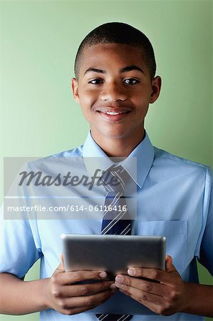 Schoolboy with digital tablet