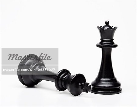 Premium Photo  Close-up king chess standing on black background.