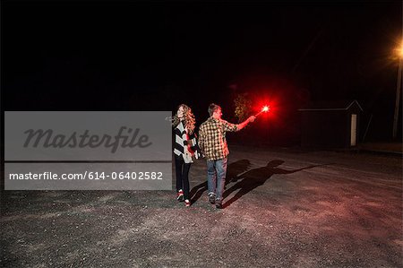 Couple holding sparkler