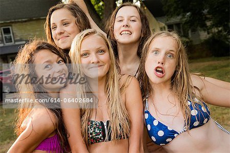 Portrait of five girls wearing bikini tops