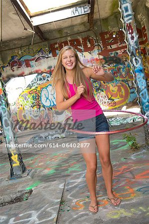 Teenage girl hula hooping