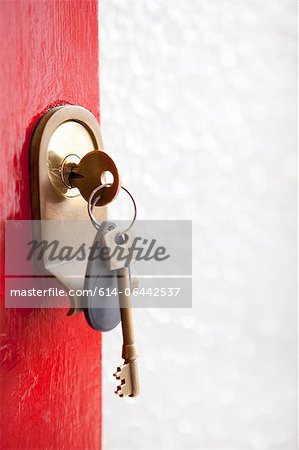 Close up of house keys in front door