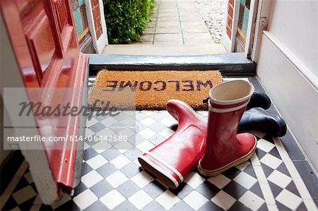 Welcome Mat And Wellington Boots Stock Photo Masterfile