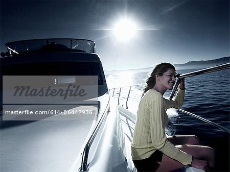 Woman on deck of yacht