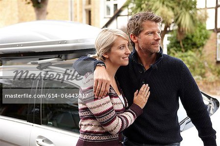 Couple by car