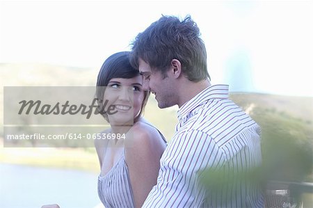 Couple smiling together outdoors