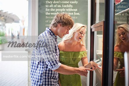 Couple window shopping for jewelry